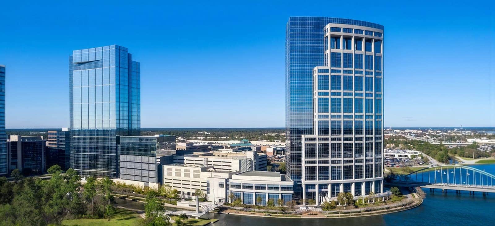 Modern Office Building With Green And Blue Vertical Louvers Glass Facade Hero 2